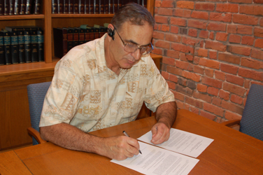 Foundation President Mike Frangadakis, signs the Articles of Incorporation for the Foundation.