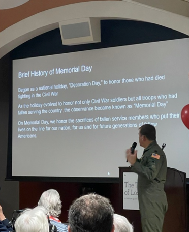 LT Walker Pearce-Percy giving a presentation