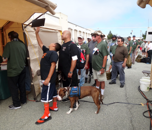 Veterans line up for services at a Veterans Stand Down