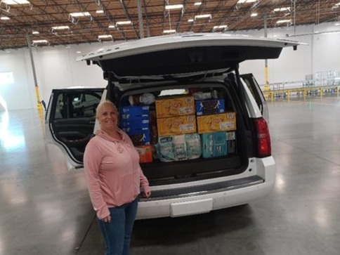 Volunteer supply drop in a van