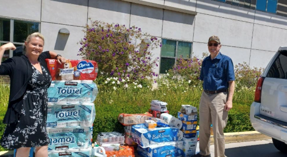 Volunteers deliver household supplies for veterans and military families